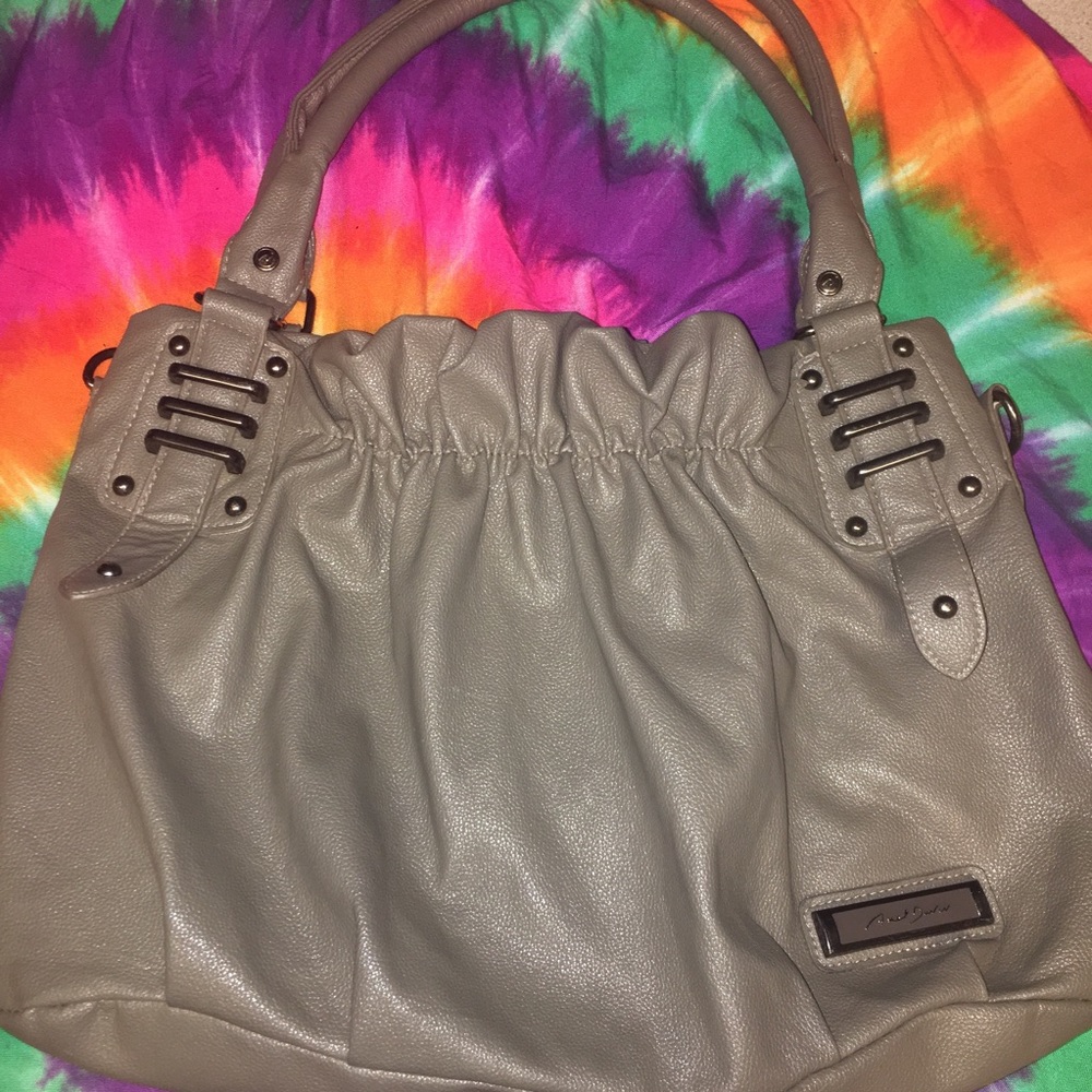 Grey ruffle style handbag